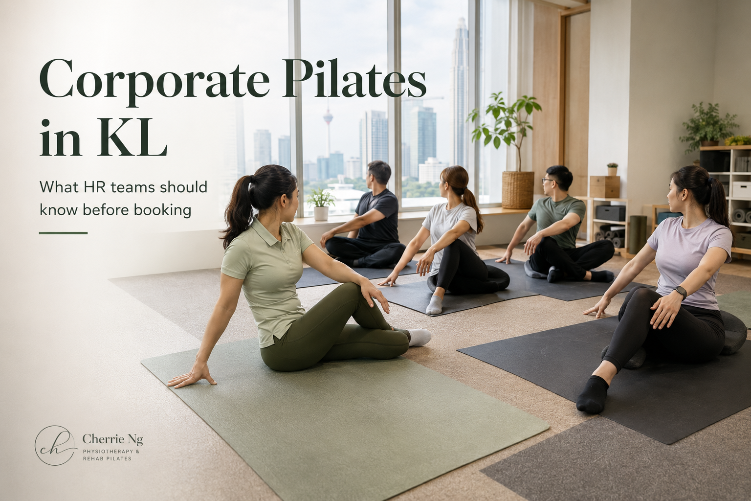 Physiotherapist leading a beginner-friendly corporate mat Pilates class for a Malaysian office team