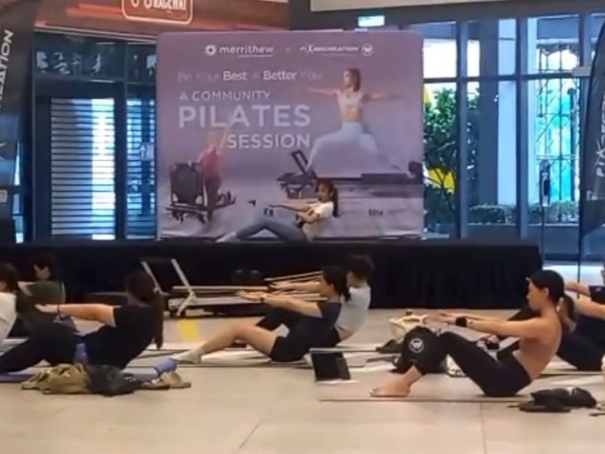 Participants following Cherrie during the F1 Creation Pilates community class at Tropicana Gardens Mall in October 2024