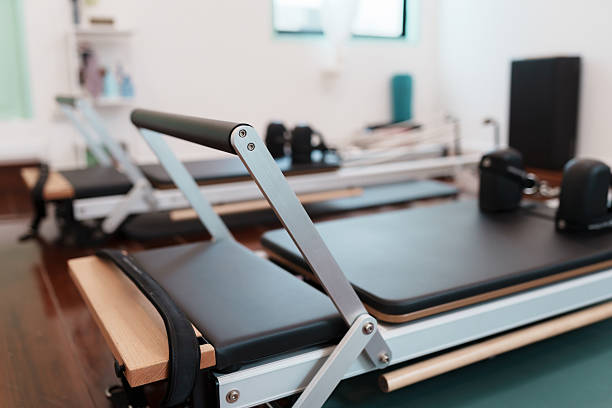 Clinical reformer Pilates equipment for physiotherapy rehabilitation and posture-focused movement training